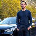Liam K. next to his BMW